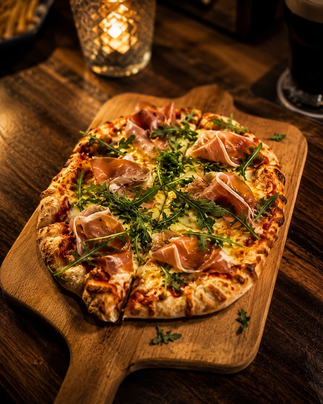 Dear Watson pinsa served on a wooden board.